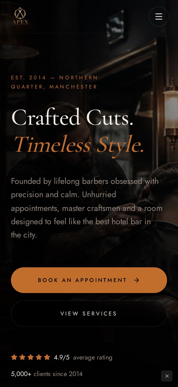 Apex Barber Studio website shown on a phone